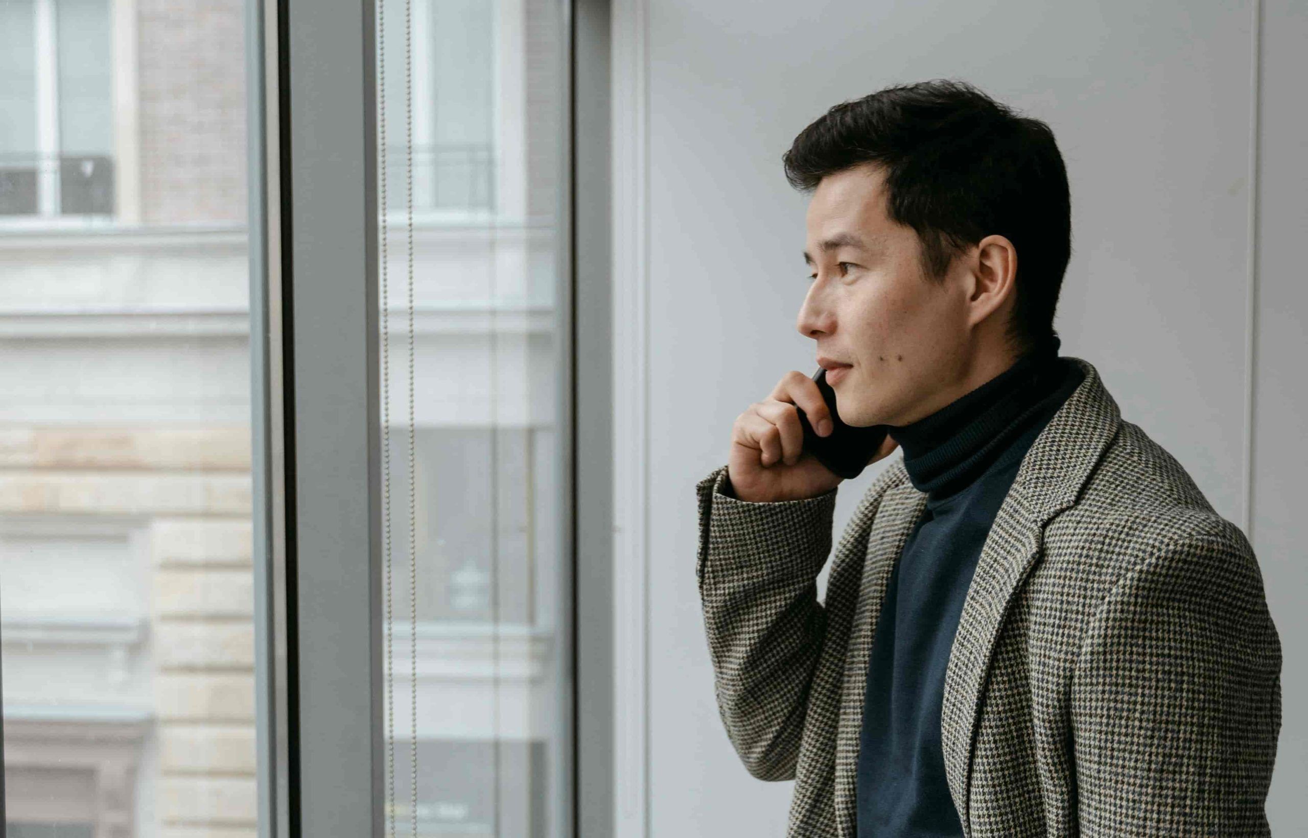 Woman wearing a sun hat outdoors in bright daylight, illustrating daily UV exposure on the skin during spring and summer