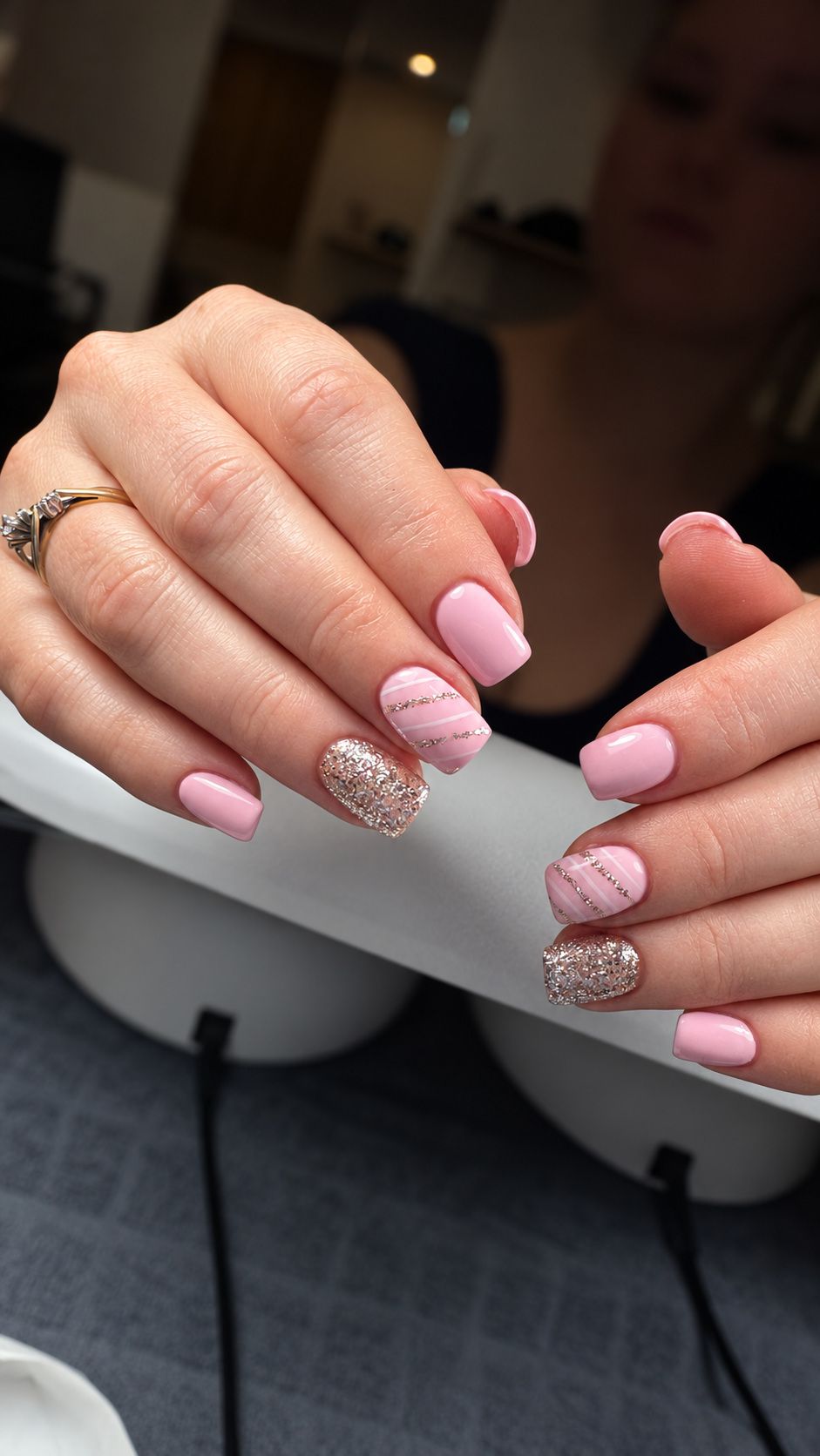 Soft pink nails with glitter and striped accents at Total Wrapture Medi Spa